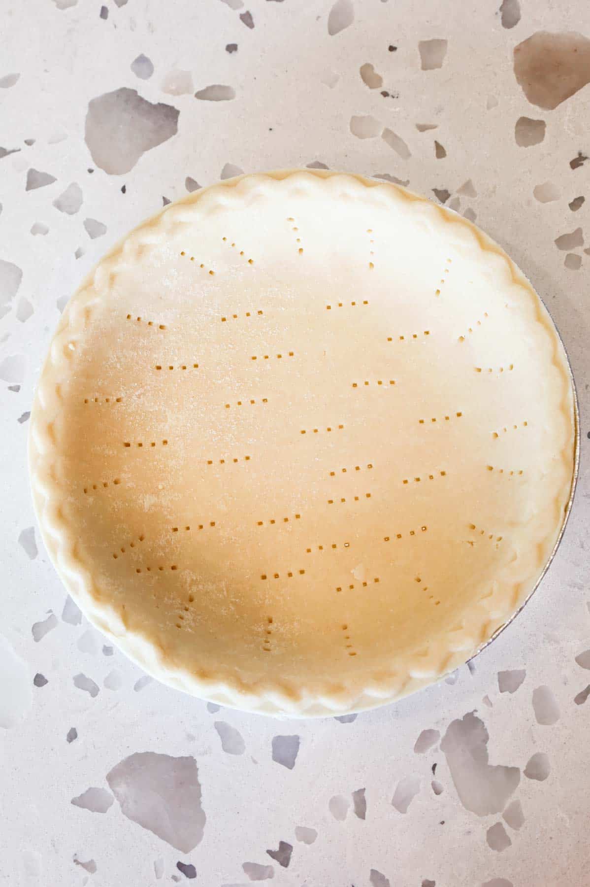 fork holes in an unbaked pie crust