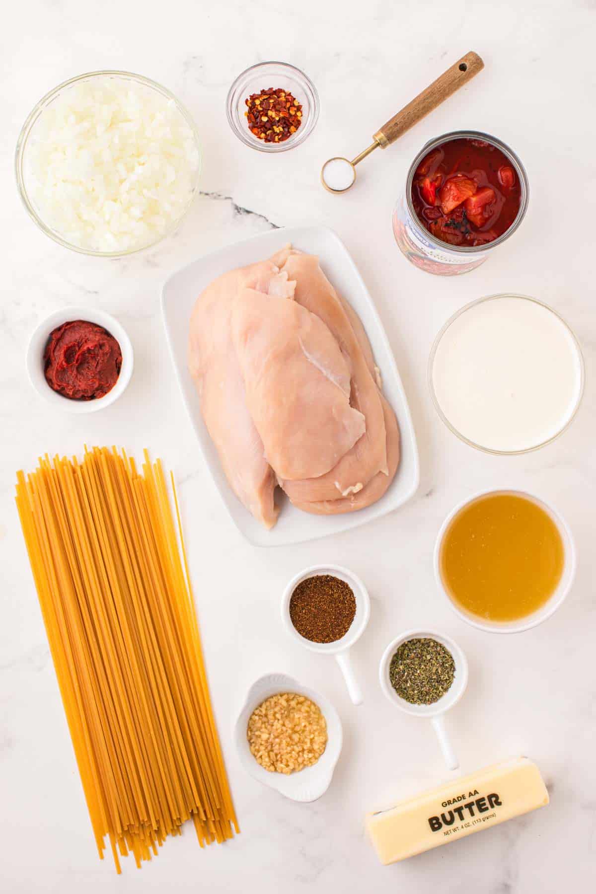 spicy chicken linguine ingredients in prep dishes