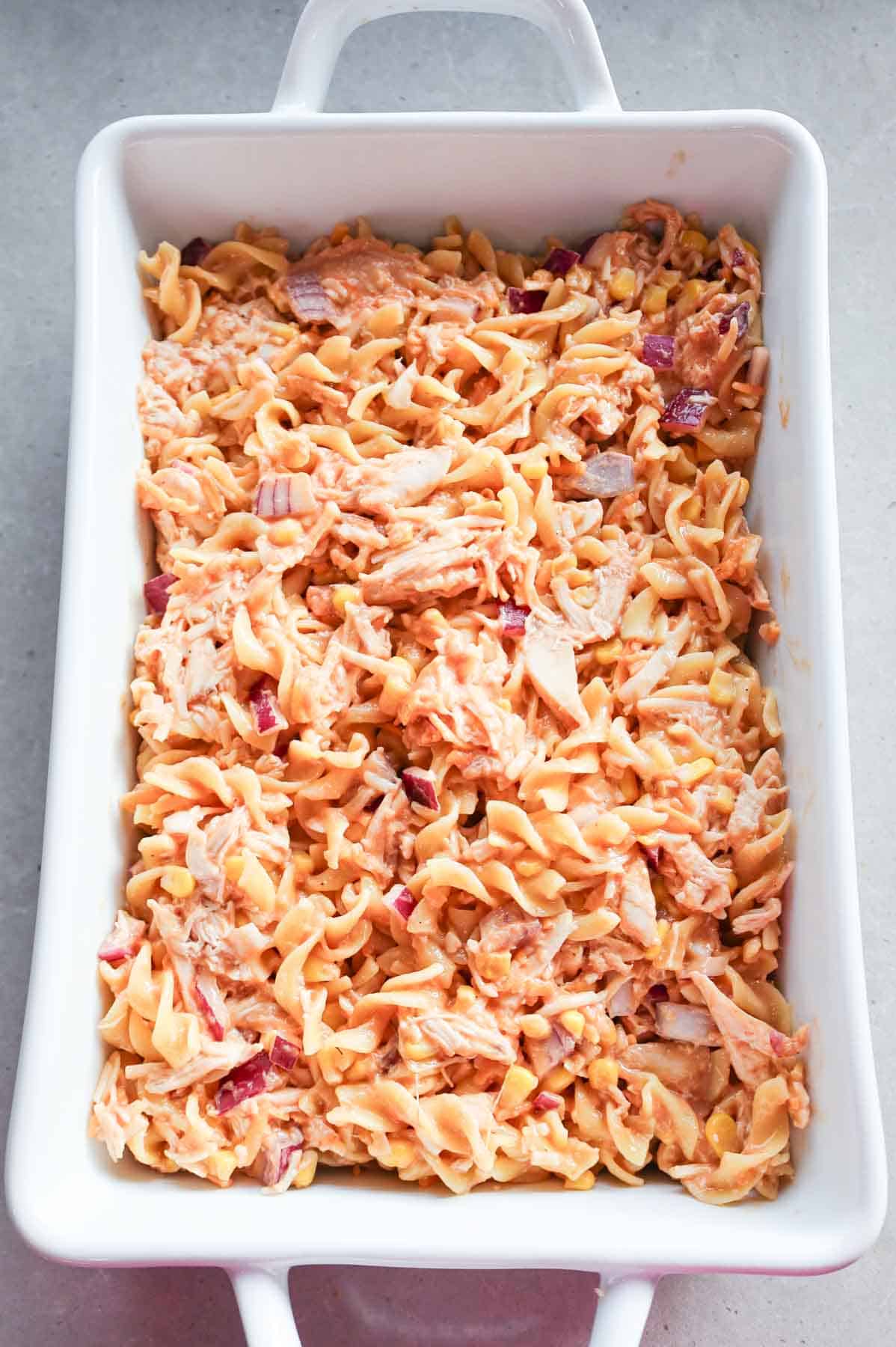 barbecue chicken and egg noodle mixture in a baking dish