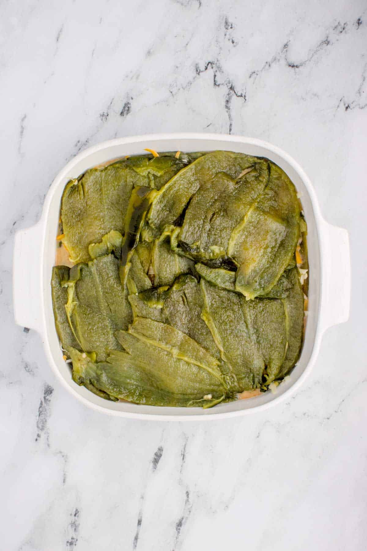 layer of roasted poblano peppers on top of casserole