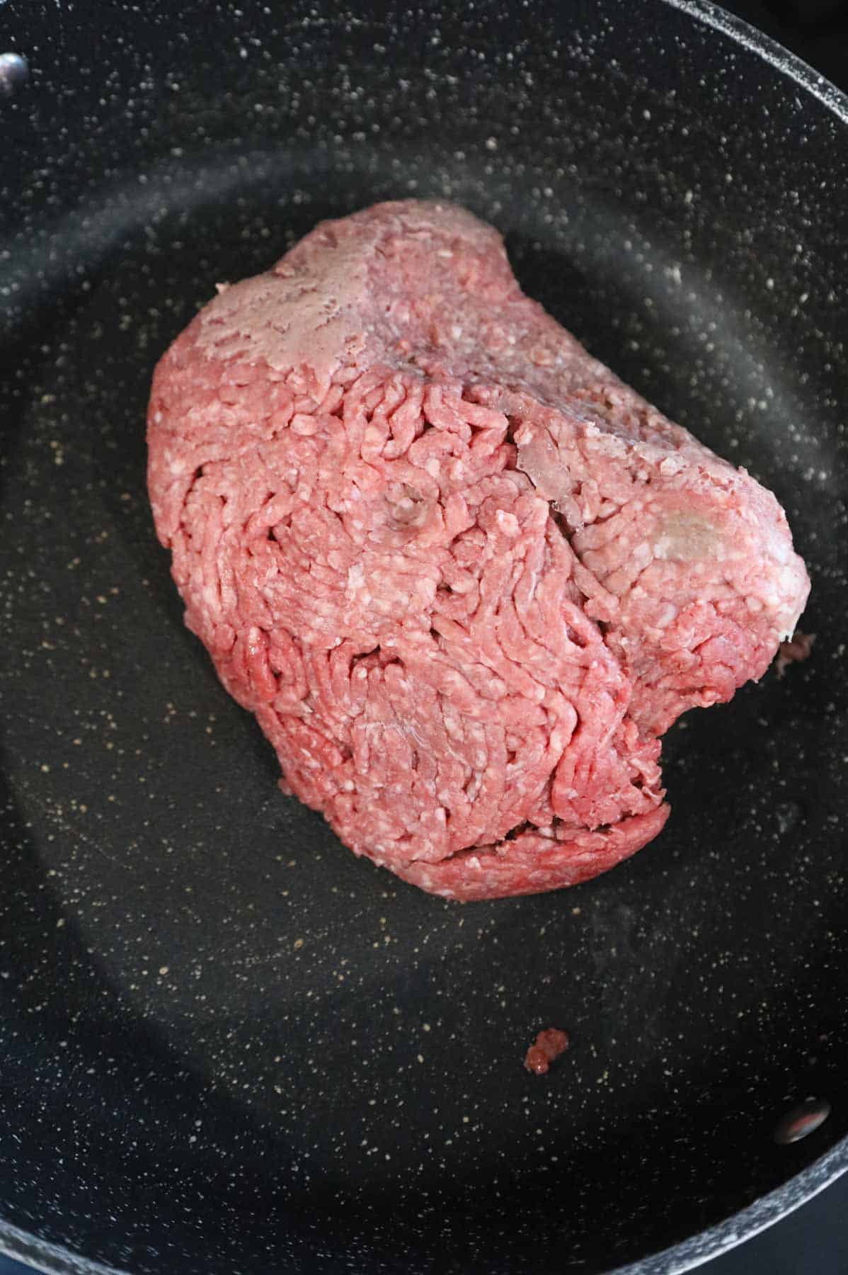 lean ground beef in a skillet