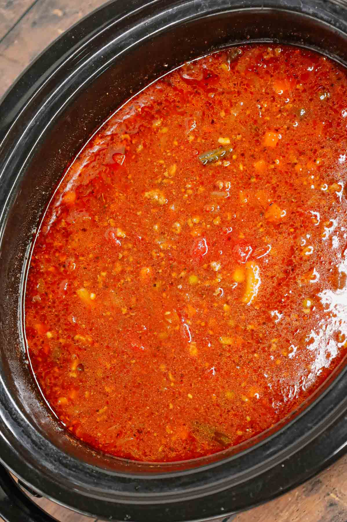 Crock Pot Hamburger Soup is hearty slow cooker dish loaded with ground beef, frozen mixed vegetables, diced tomatoes, tomato sauce and beef broth.