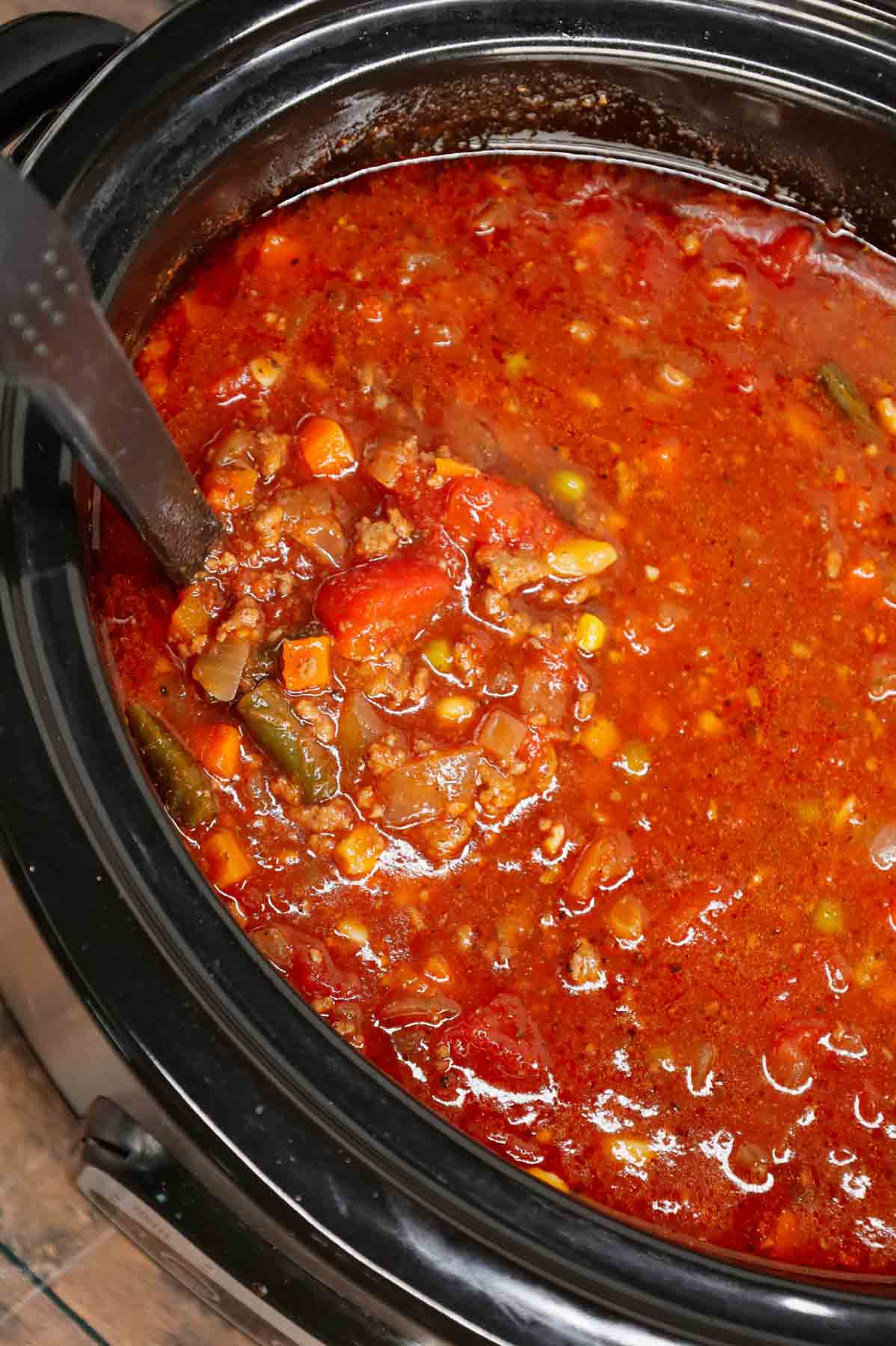 Crock Pot Hamburger Soup is hearty slow cooker dish loaded with ground beef, frozen mixed vegetables, diced tomatoes, tomato sauce and beef broth.