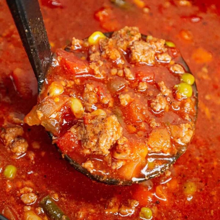 Crock Pot Hamburger Soup is hearty slow cooker dish loaded with ground beef, frozen mixed vegetables, diced tomatoes, tomato sauce and beef broth.