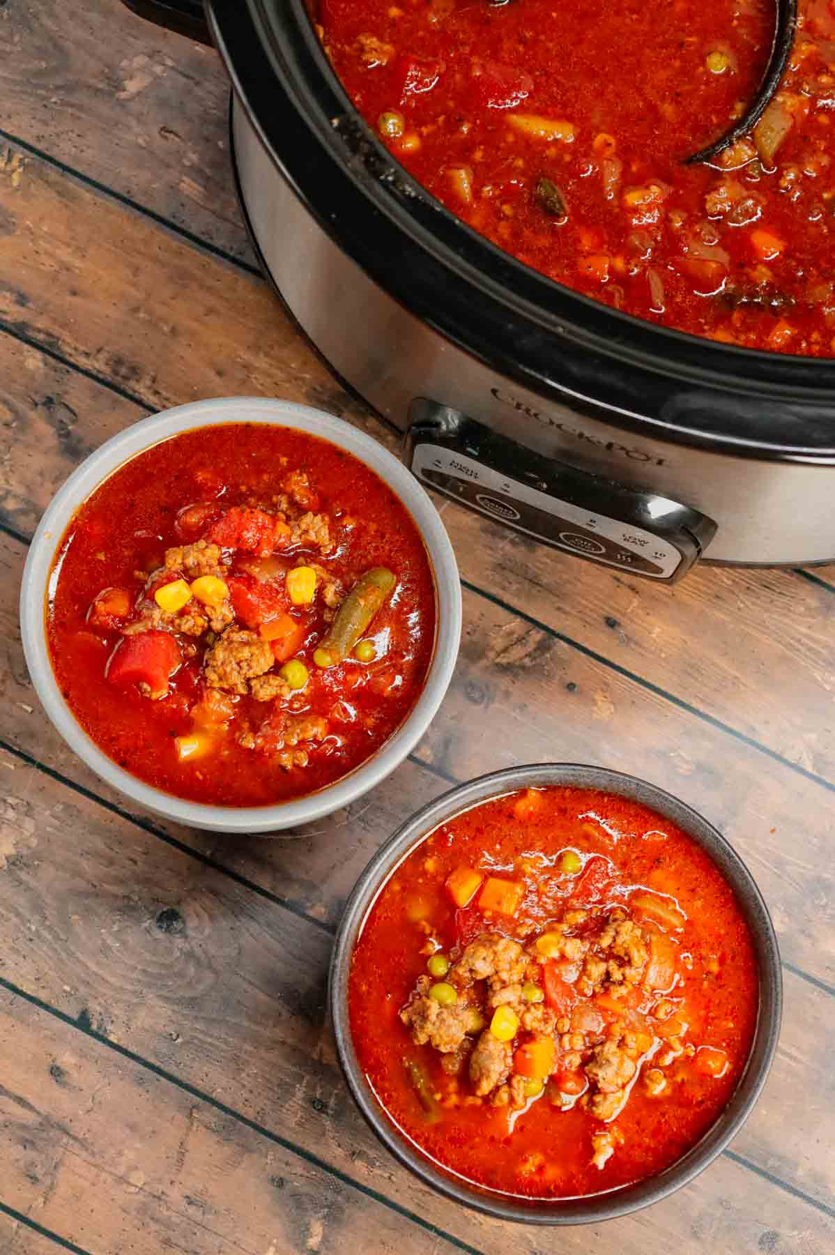 Crock Pot Hamburger Soup is hearty slow cooker dish loaded with ground beef, frozen mixed vegetables, diced tomatoes, tomato sauce and beef broth.