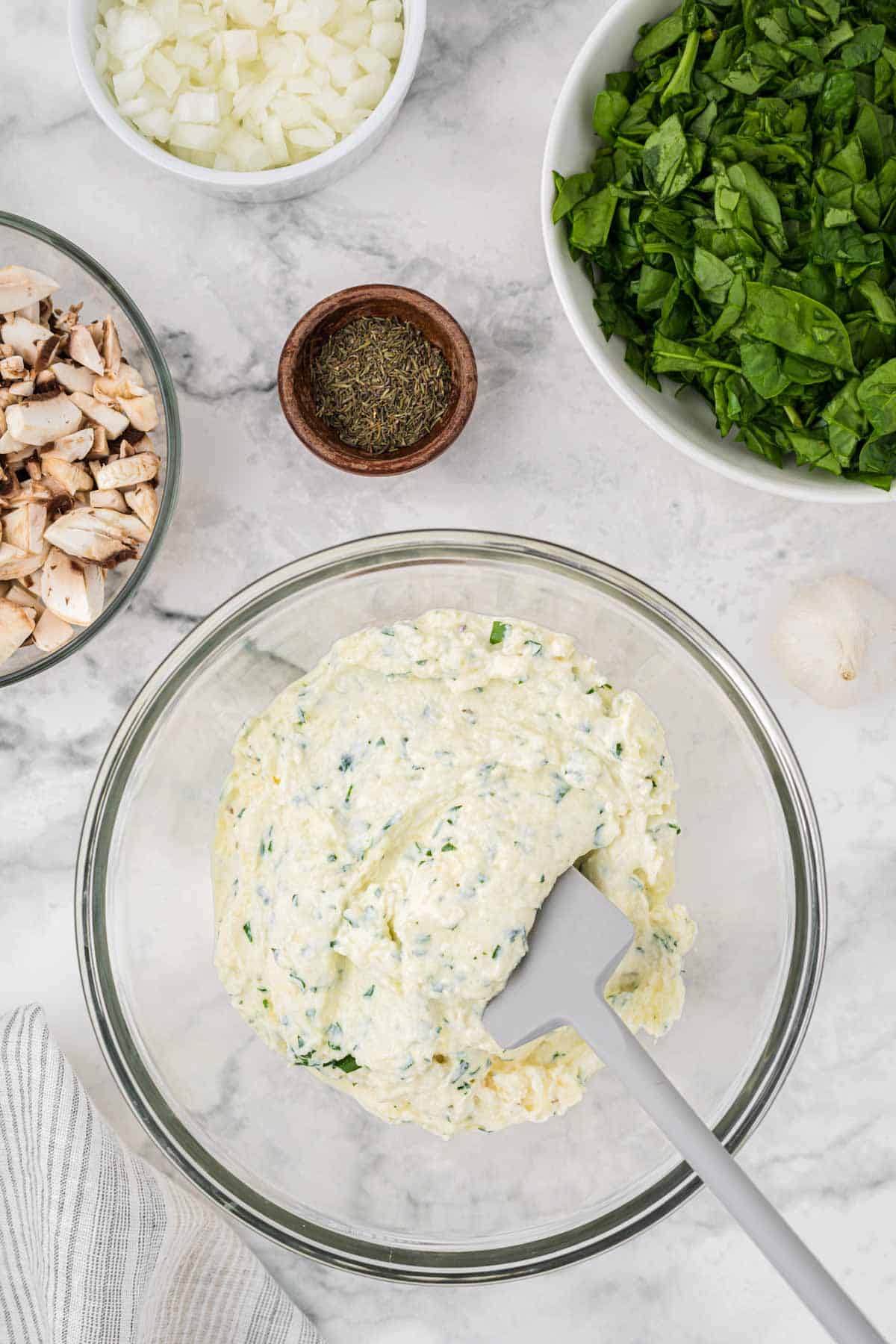 ricotta cheese mixture in a mixing bowl