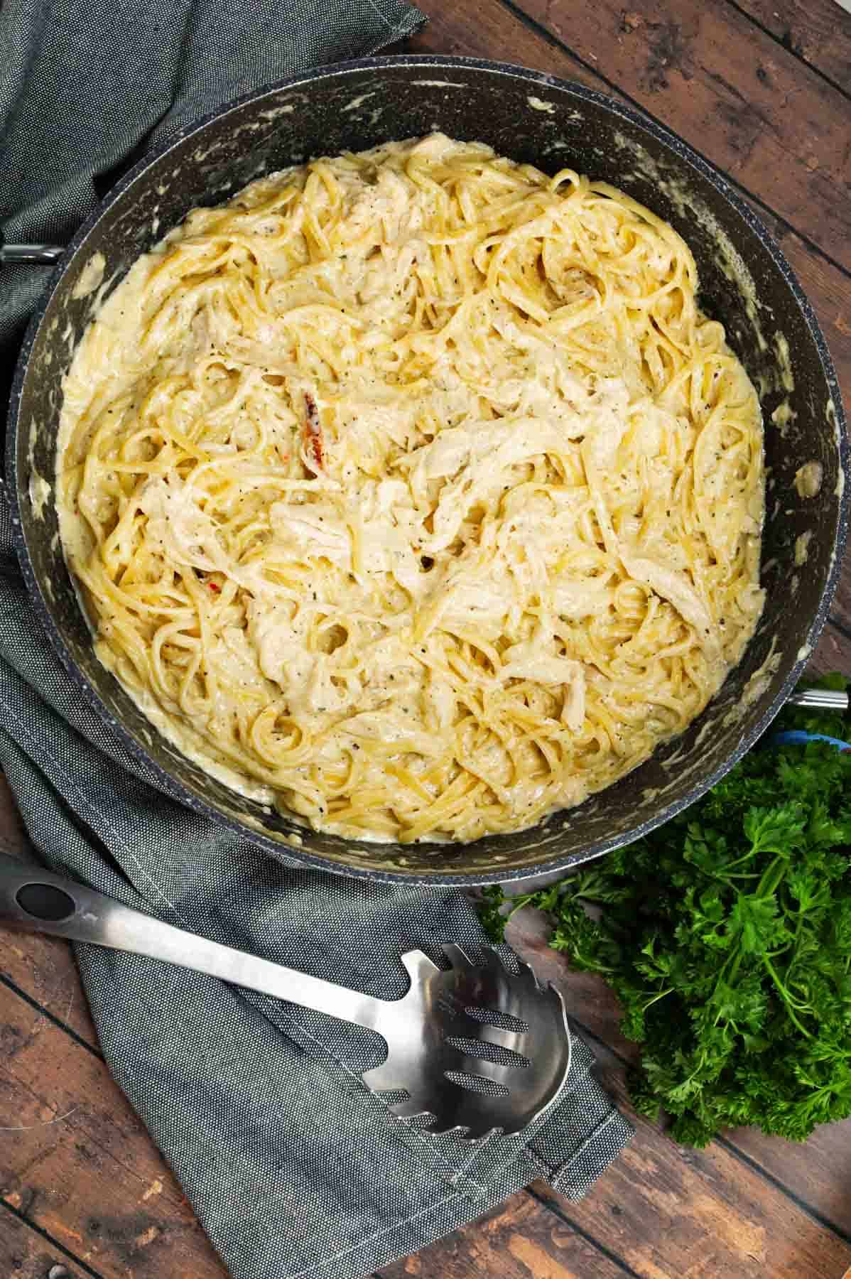 Chicken Alfredo Linguine is a delicious pasta recipe with a creamy garlic parmesan sauce and loaded with shredded rotisserie chicken.