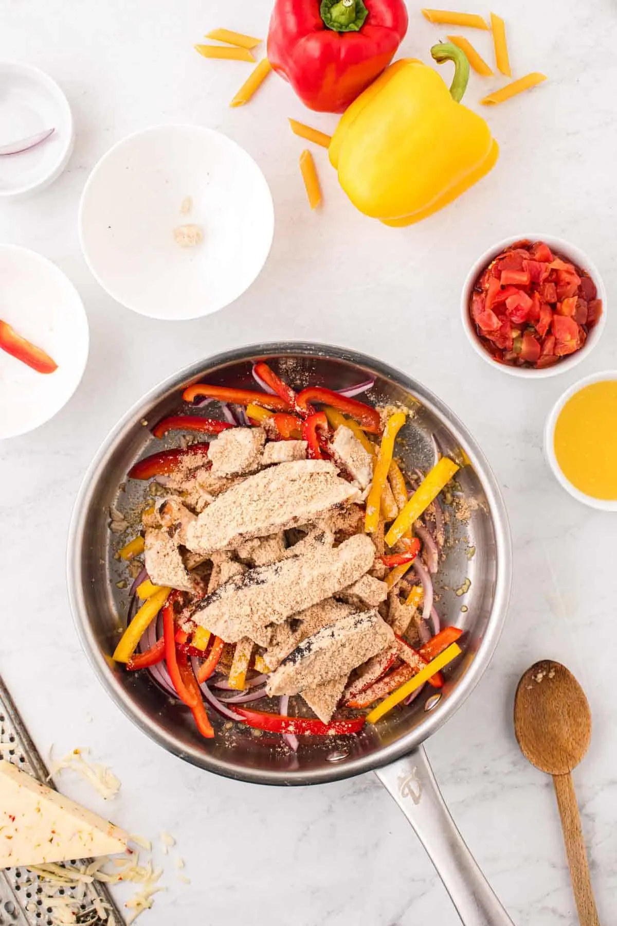 sliced chicken breasts and bell peppers tossed in fajita seasoning