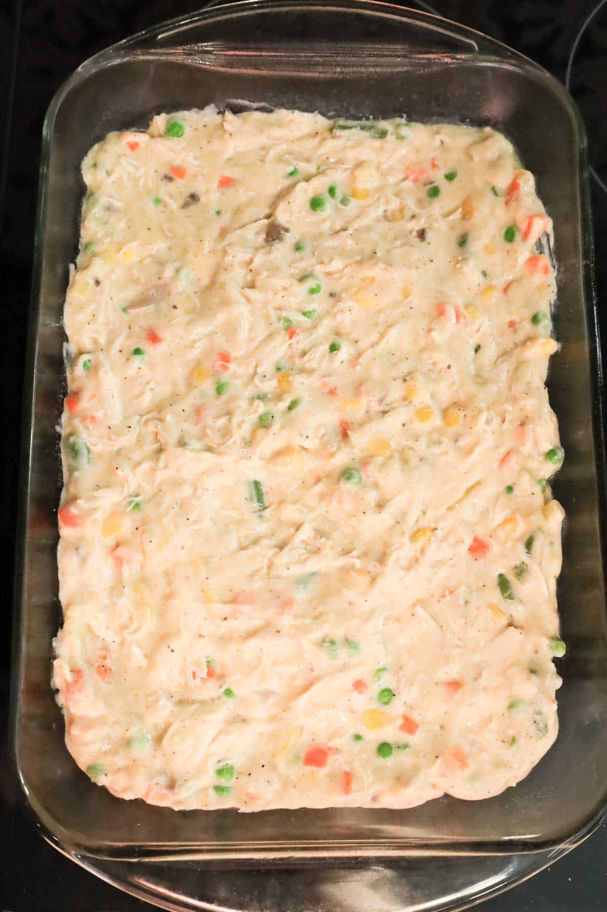 creamy chicken and vegetable mixture in a baking dish