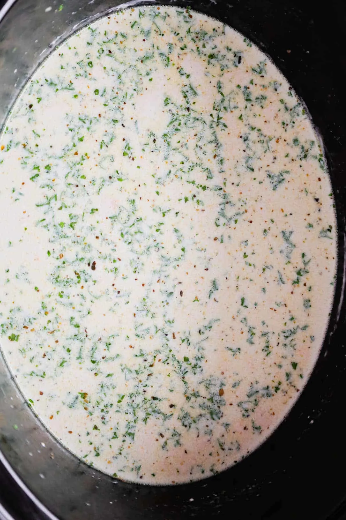 creamy garlic parmesan sauce in a crock pot