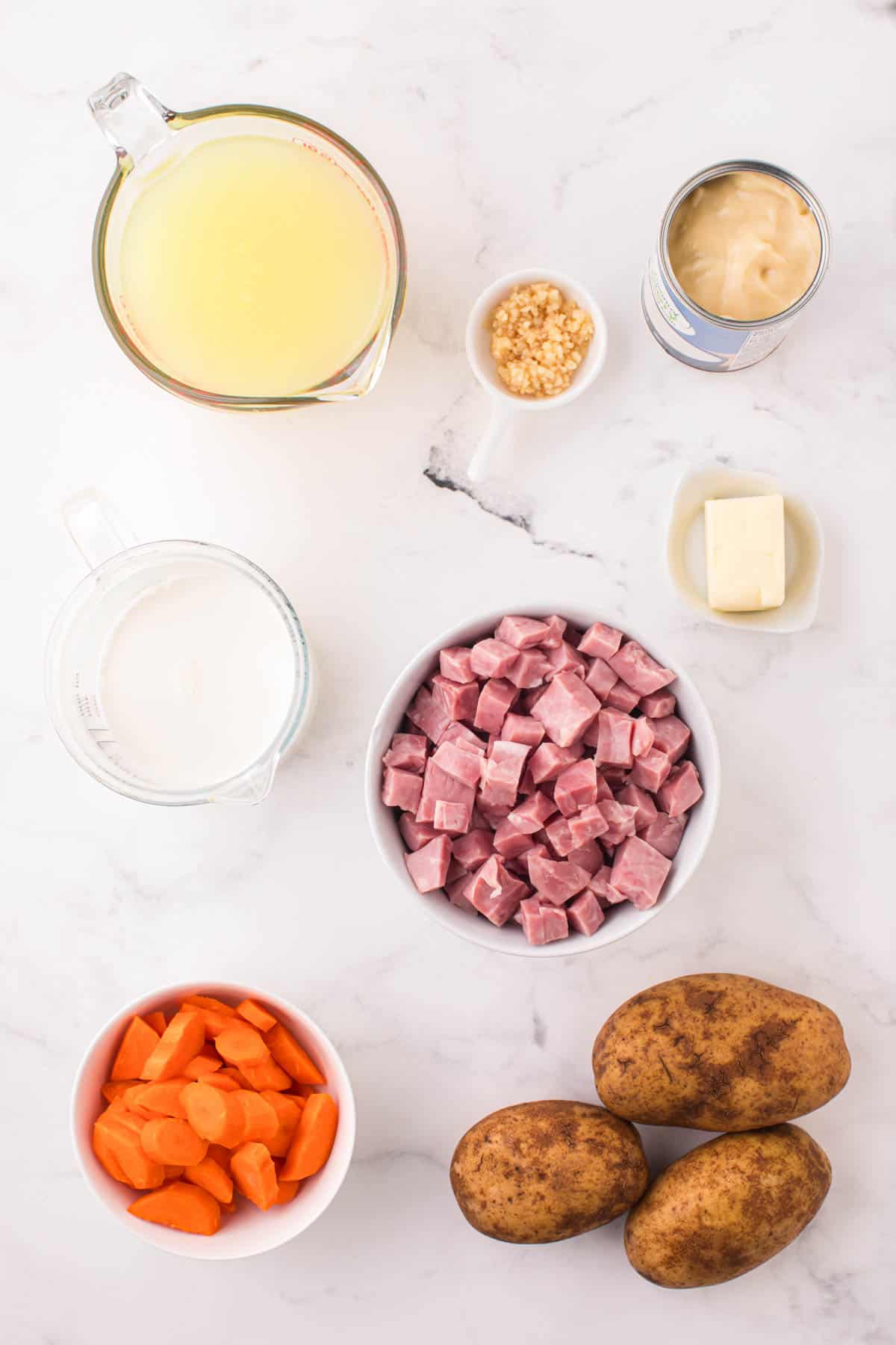 ham and potato soup ingredients in prep bowls