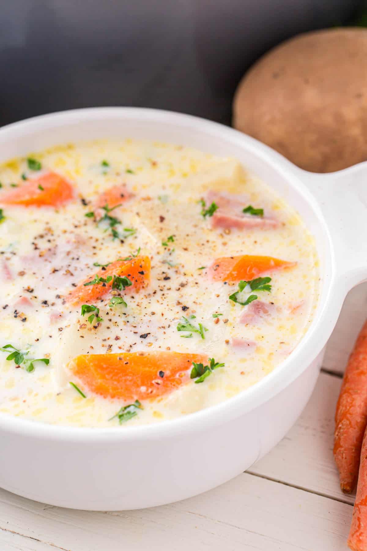Ham and Potato Soup is a delicious creamy soup loaded with diced ham, sliced carrots and cubed potatoes.