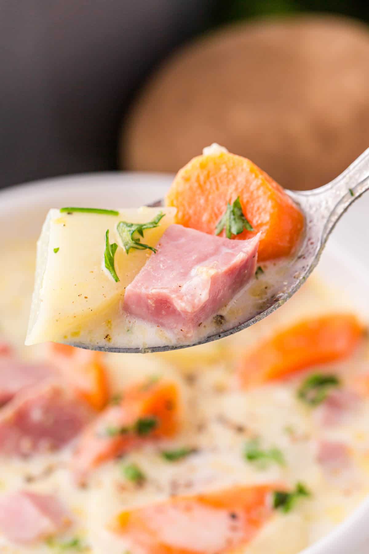 Ham and Potato Soup is a delicious creamy soup loaded with diced ham, sliced carrots and cubed potatoes.