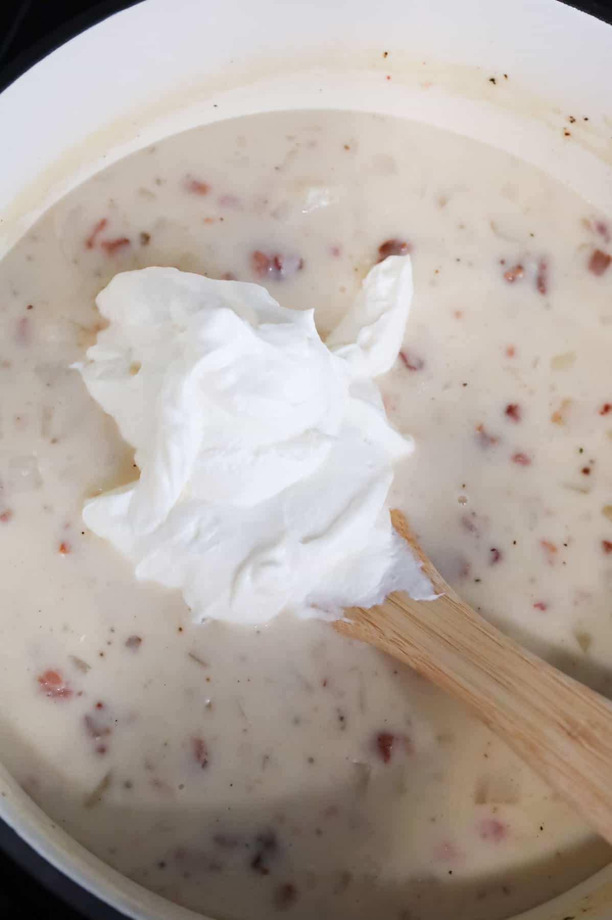 sour cream added to potato bacon soup