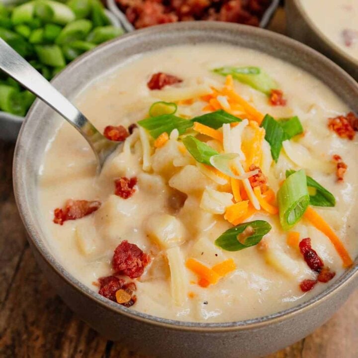 Hash Brown Potato Soup is a hearty soup recipe made with frozen diced hash brown potatoes, chicken broth, milk, diced onions, bacon crumble and cheddar cheese.