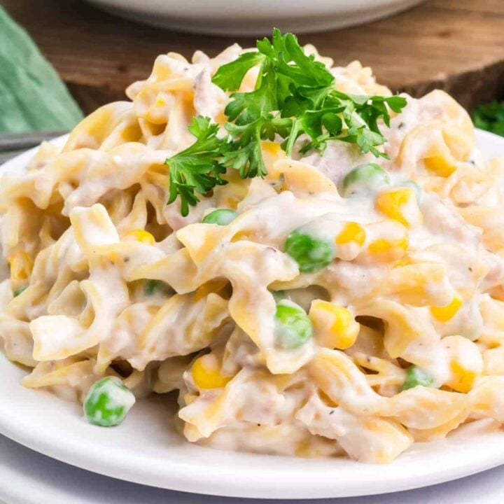 Homemade Tuna Helper is a delicious twist on boxed tuna helper loaded with egg noodles, green peas, corn, cream cheese, parmesan cheese and tuna all in a creamy sauce.