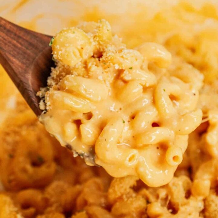 One Pot Mac and Cheese is a creamy and delicious pasta dish made with milk, cavatappi noodles, condensed cheddar soup, shredded cheddar cheese, mozzarella cheese, parmesan cheese and crushed Ritz crackers.