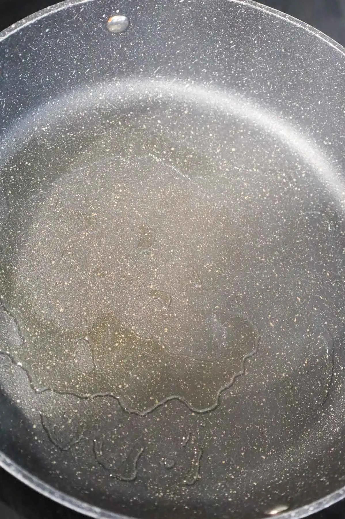 oil heating in a skillet