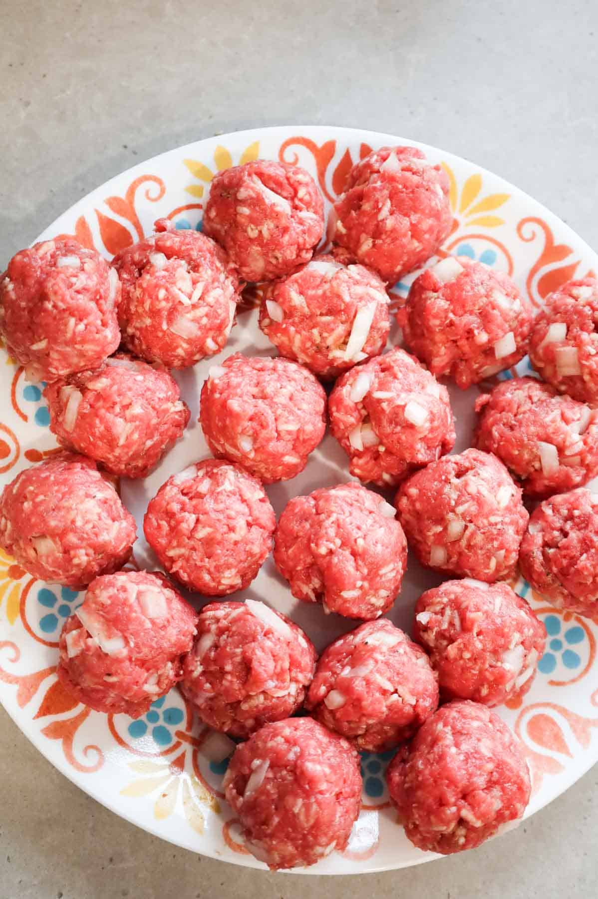 raw porcupine meatballs on a plate