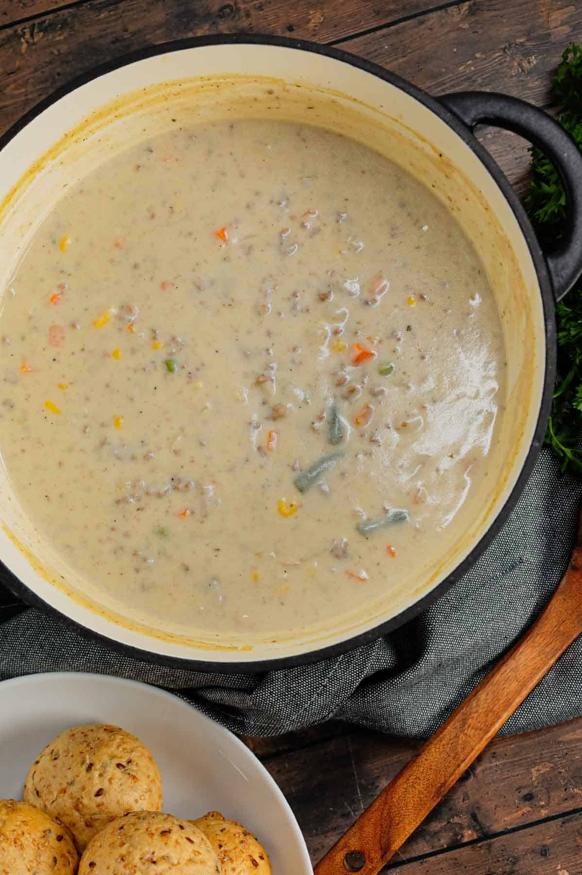 Shepherd's Pie Soup is a hearty soup loaded with instant mashed potatoes, ground beef, chicken broth, half and half, diced onions and frozen mixed vegetables.