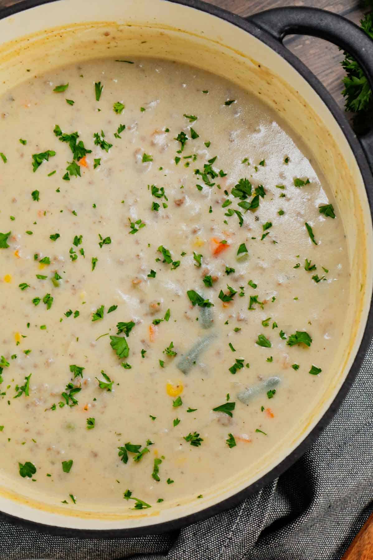 Shepherd's Pie Soup is a hearty soup loaded with instant mashed potatoes, ground beef, chicken broth, half and half, diced onions and frozen mixed vegetables.