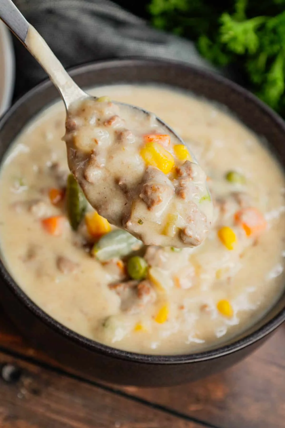 Shepherd's Pie Soup is a hearty soup loaded with instant mashed potatoes, ground beef, chicken broth, half and half, diced onions and frozen mixed vegetables.
