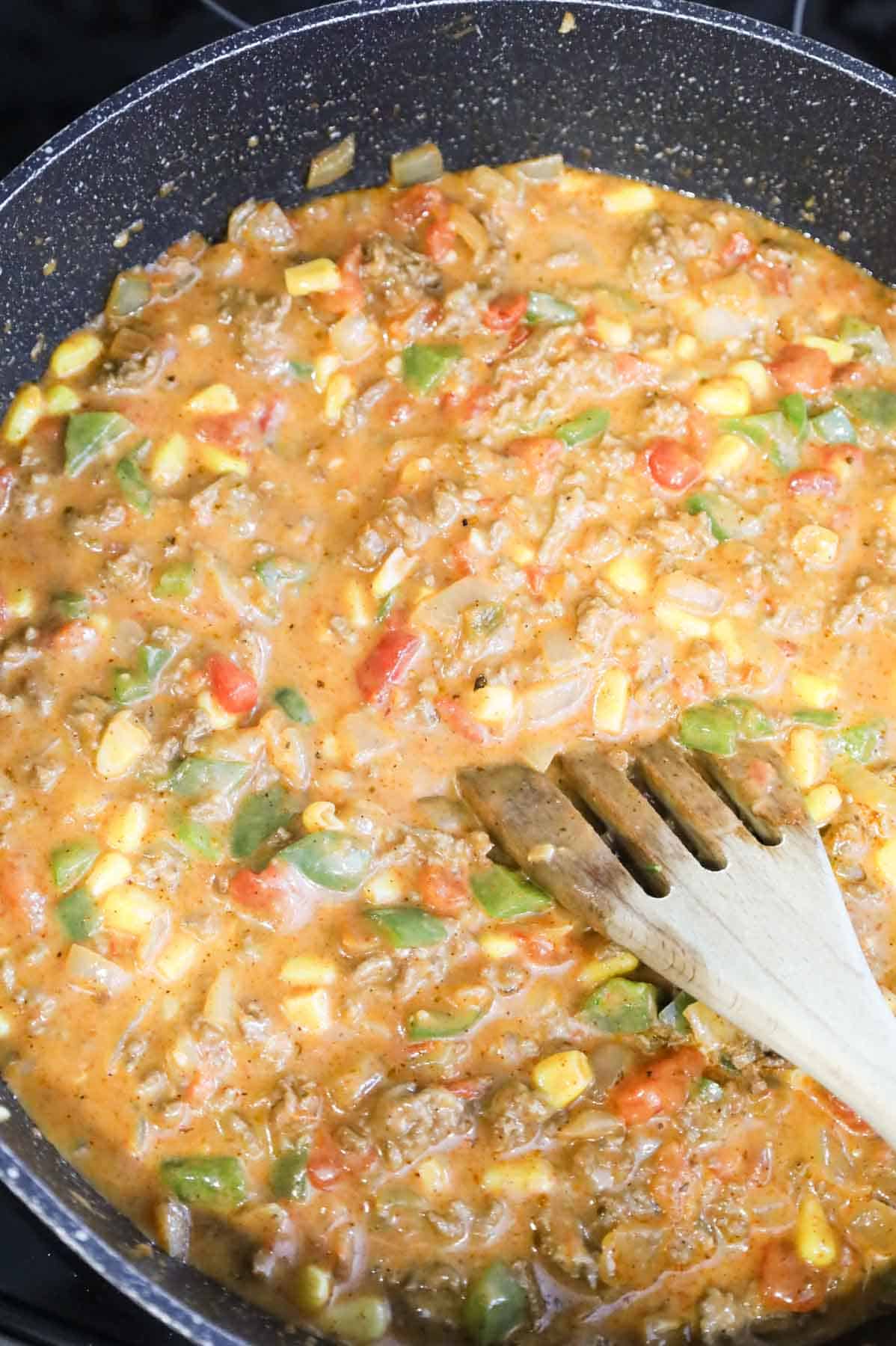 ground beef taco and cheddar soup mixture in a skillet