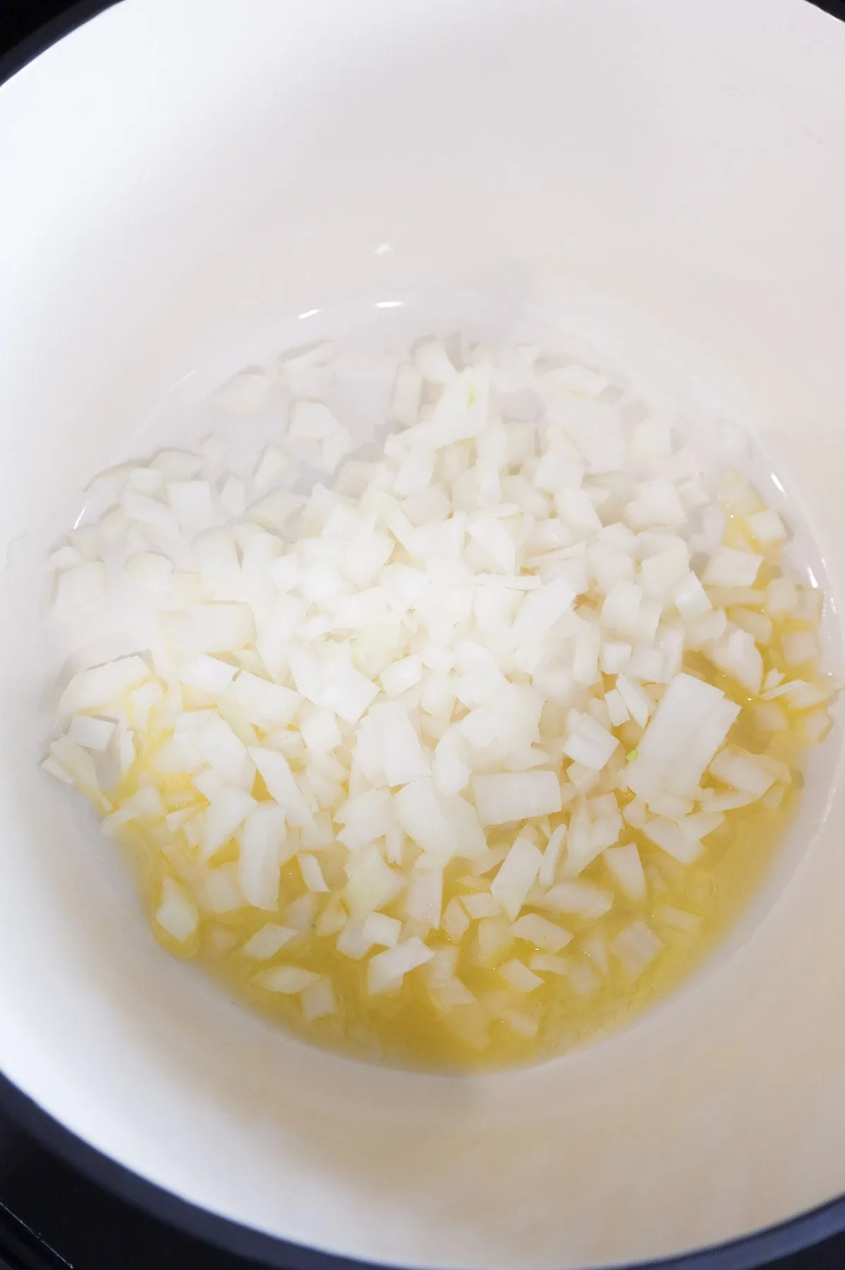 diced onions added to pot with melted butter