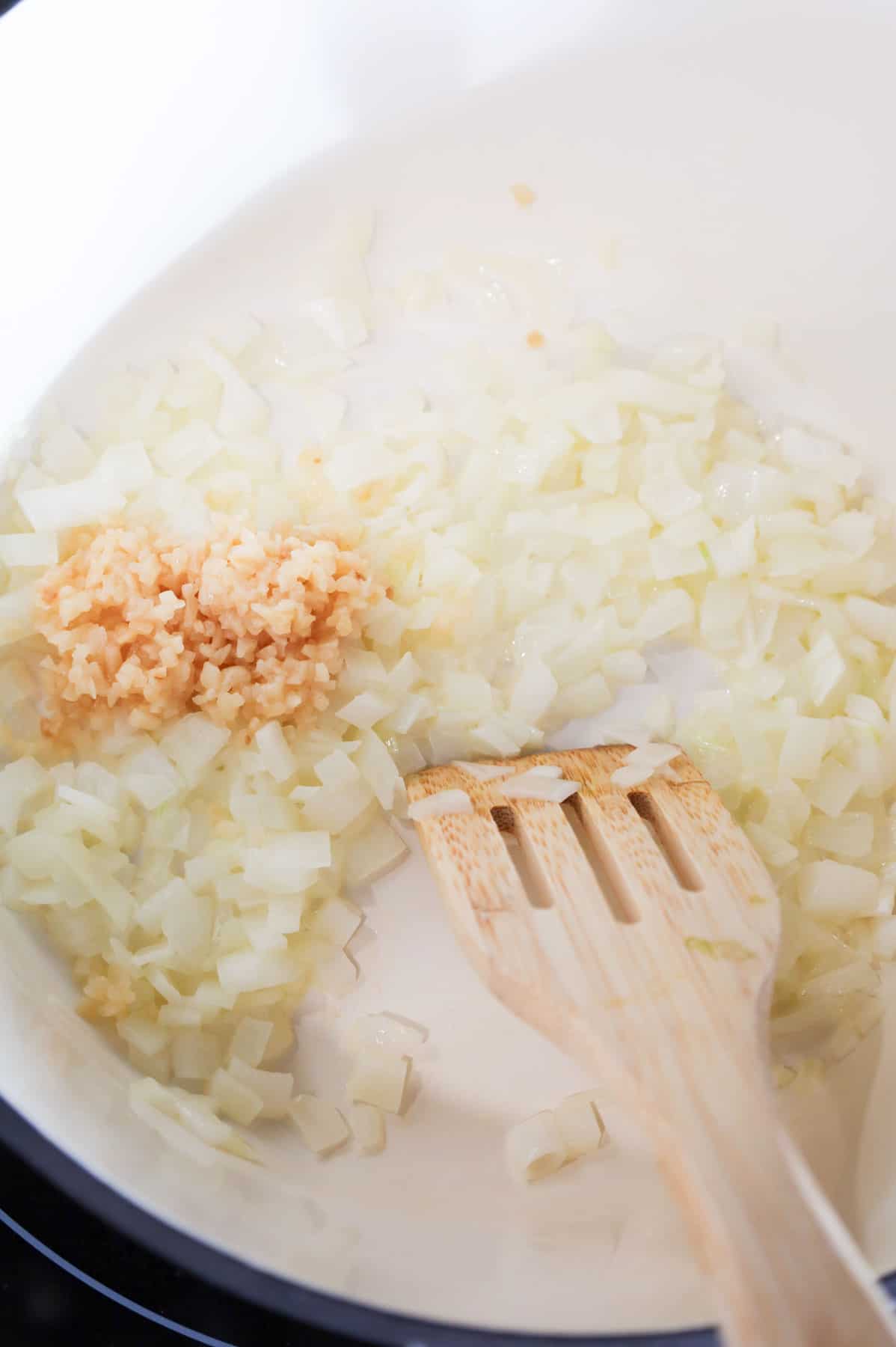 minced garlic added to pot with cooked diced onions