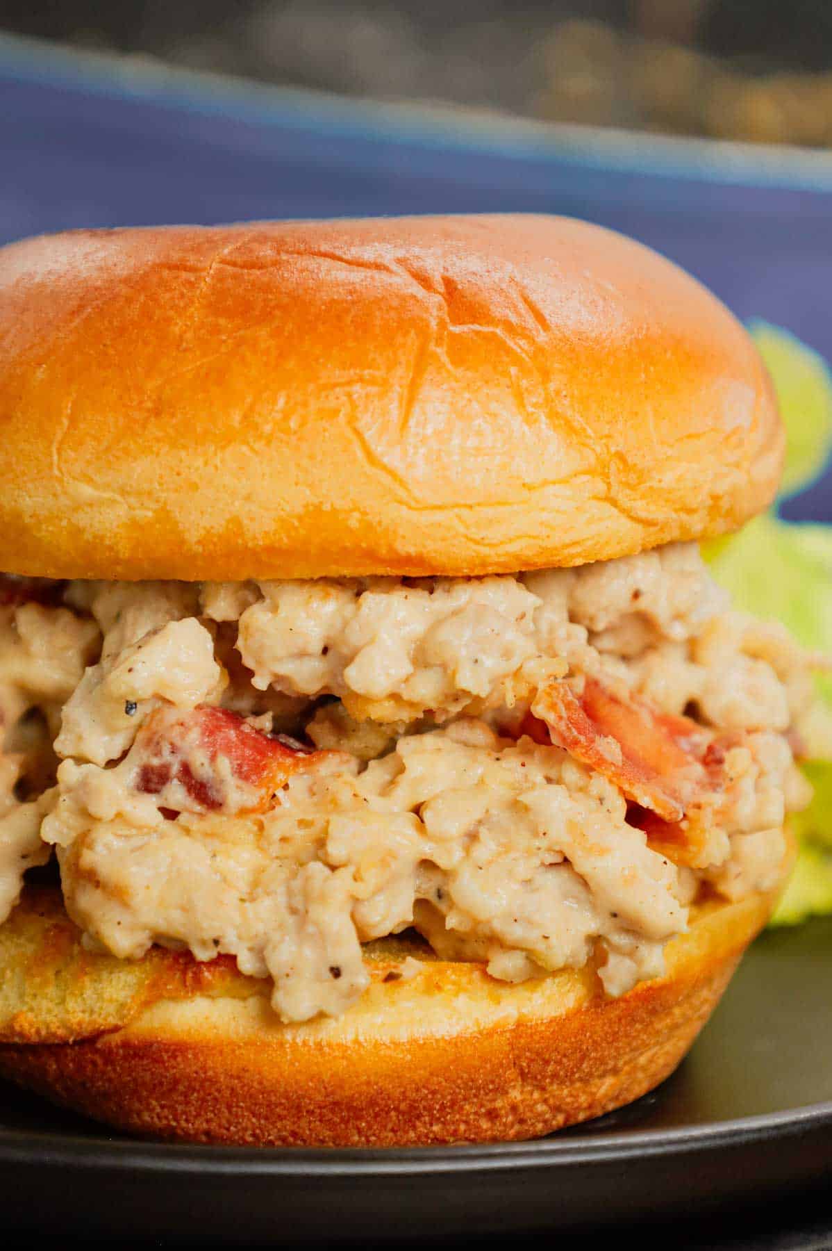Chicken Alfredo Sloppy Joes are delicious sandwiches loaded with ground chicken and crisp bacon tossed in alfredo sauce and served on toasted garlic buttered brioche buns.