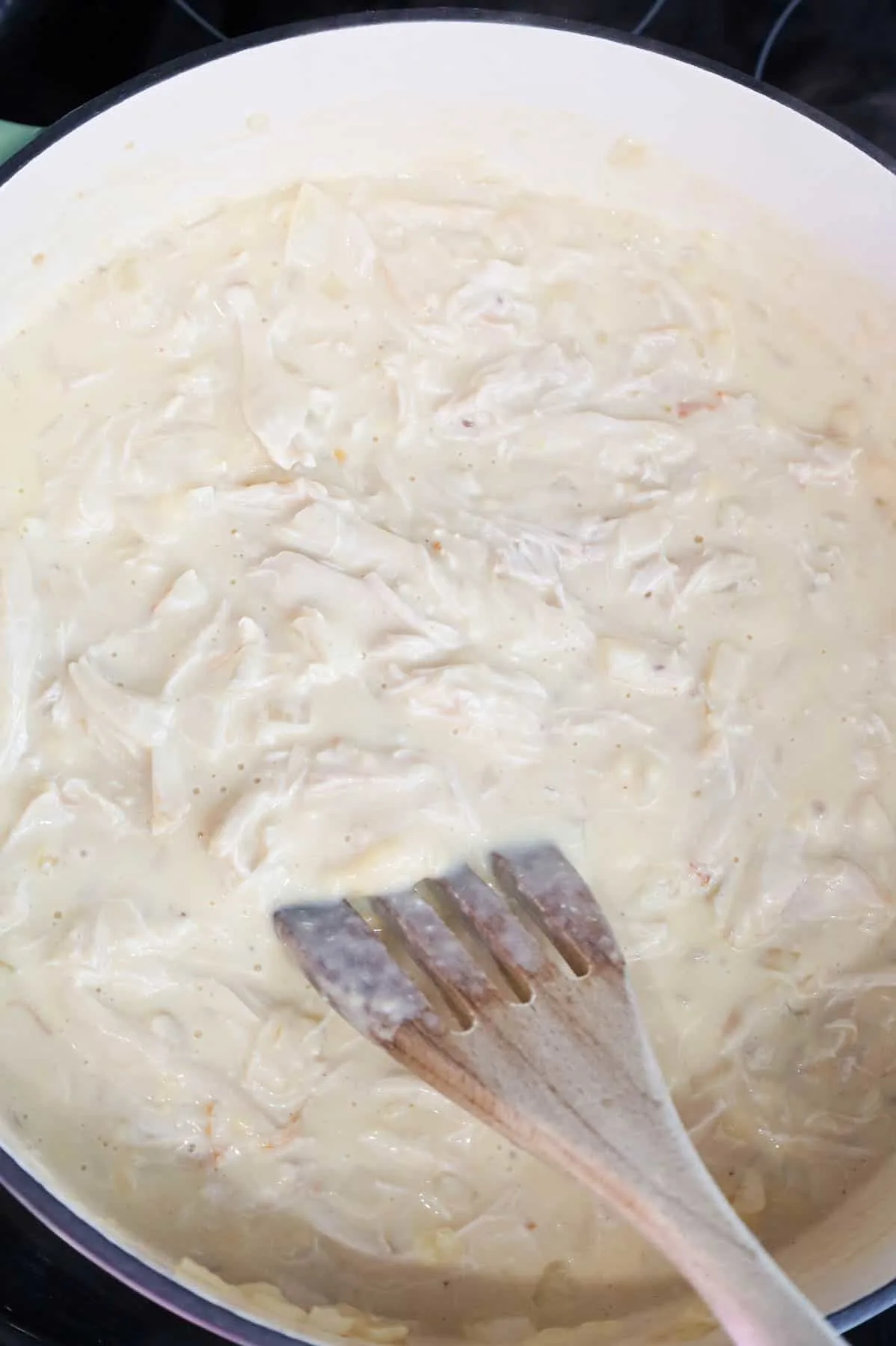 creamy chicken mixture in a skillet