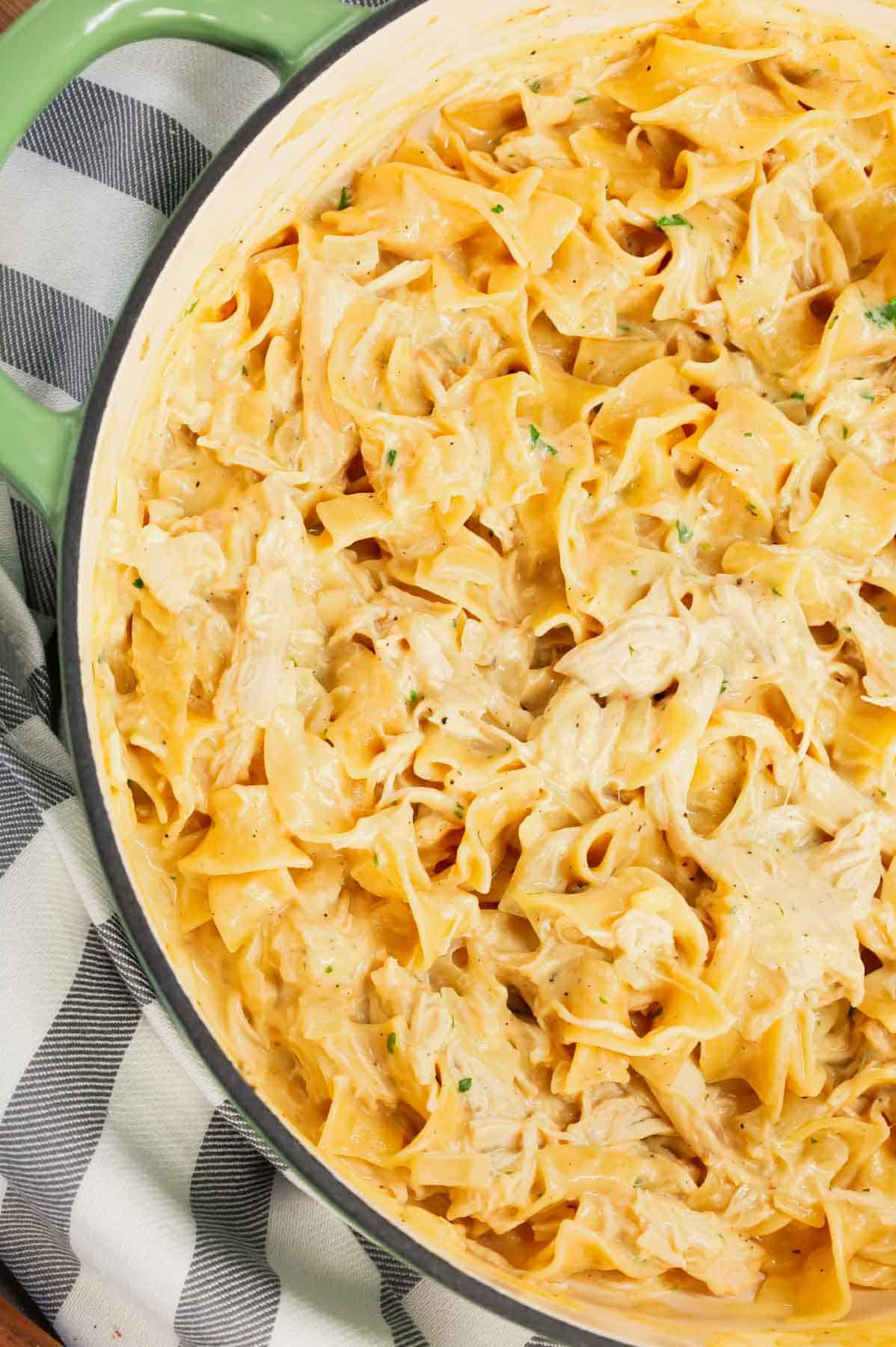 Chicken and Egg Noodles is a simple comfort food dish made with shredded rotisserie chicken, extra broad egg noodles, diced onion, cream of chicken soup and milk.