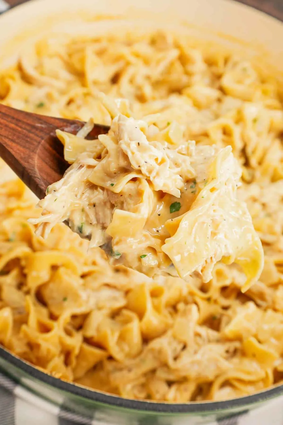 Chicken and Egg Noodles is a simple comfort food dish made with shredded rotisserie chicken, extra broad egg noodles, diced onion, cream of chicken soup and milk.