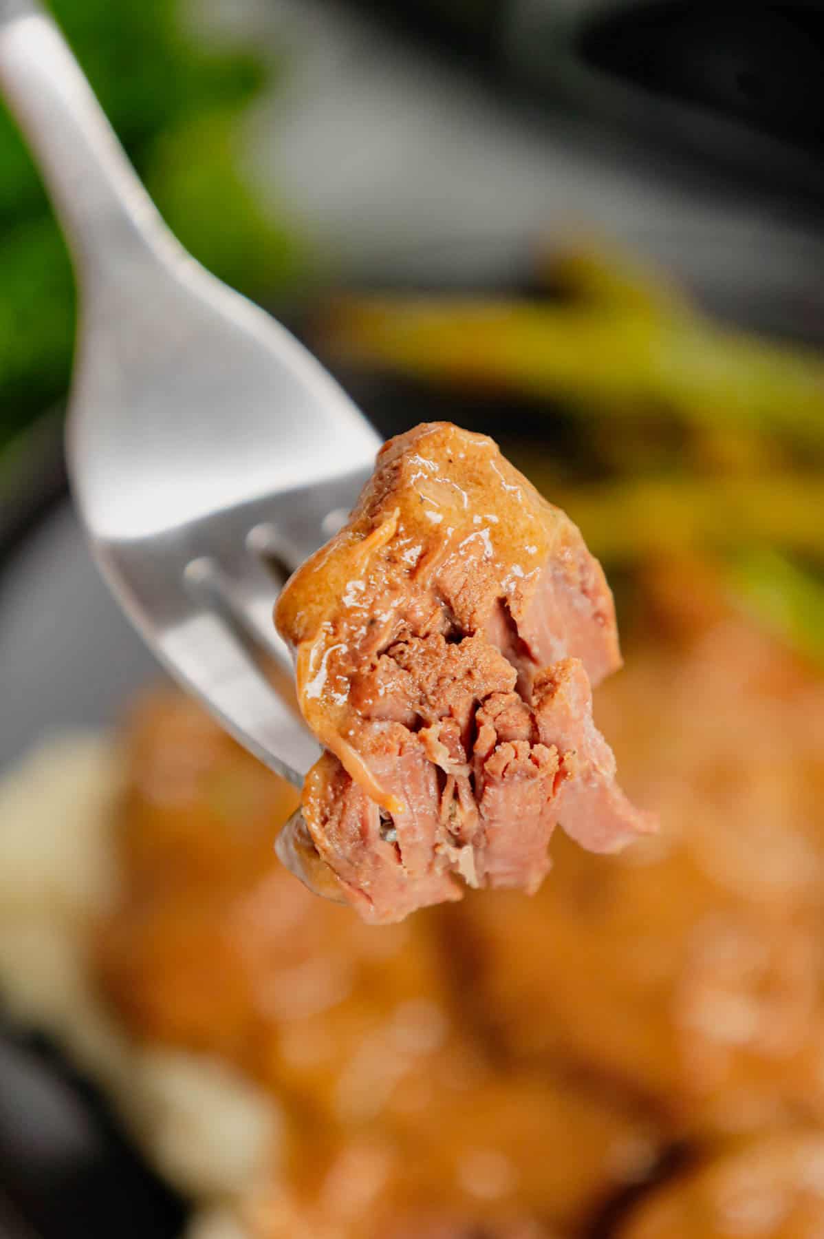 Crock Pot Beef Tips is a delicious slow cooker dinner recipe made with chunks of stewing beef, sliced onions, cream of mushroom soup, beef broth and beef gravy mix.