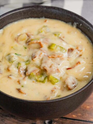 Philly Cheese Steak Soup is a hearty soup loaded with chopped deli roast beef, diced onions, green bell peppers, sliced mushrooms and provolone cheese.