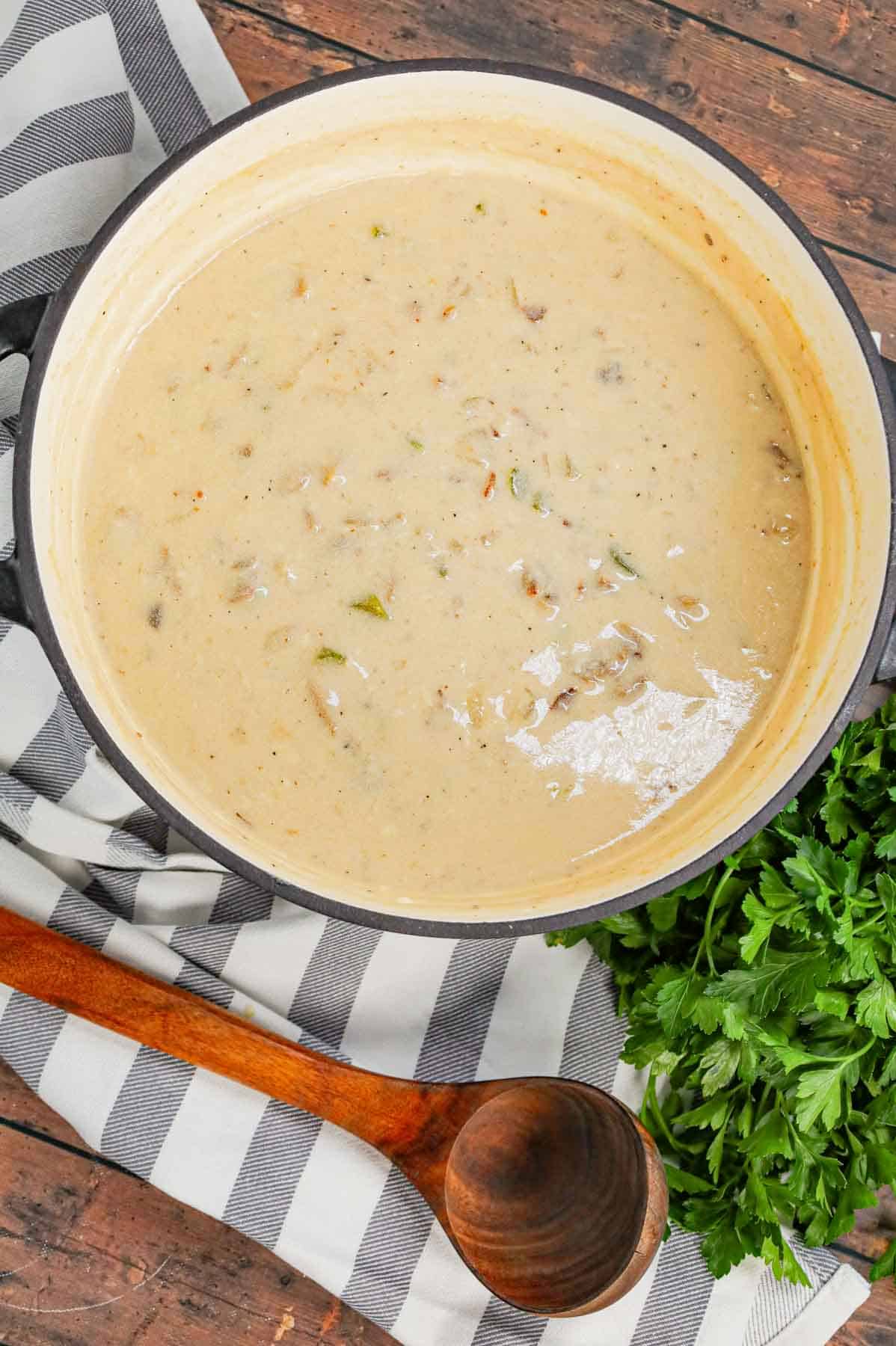 Philly Cheese Steak Soup is a hearty soup loaded with chopped deli roast beef, diced onions, green bell peppers, sliced mushrooms and provolone cheese.