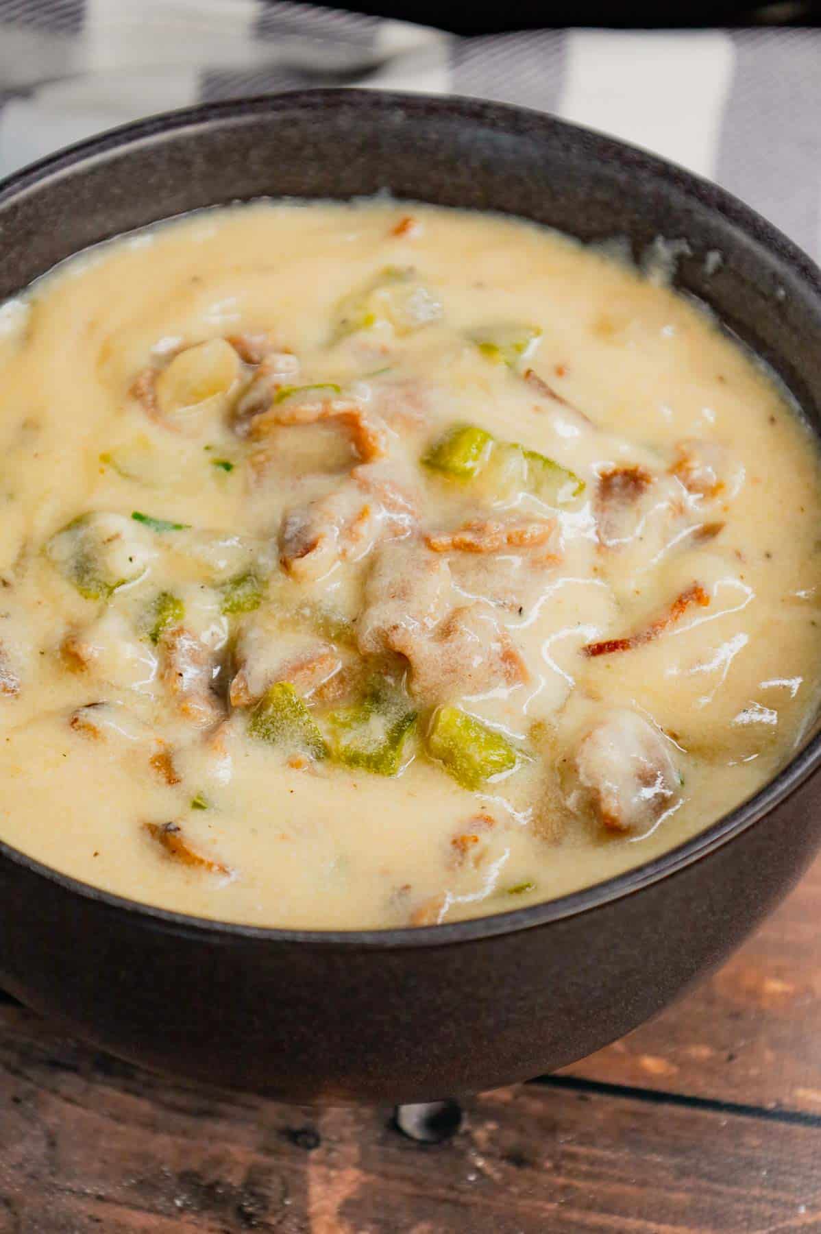 Philly Cheese Steak Soup is a hearty soup loaded with chopped deli roast beef, diced onions, green bell peppers, sliced mushrooms and provolone cheese.