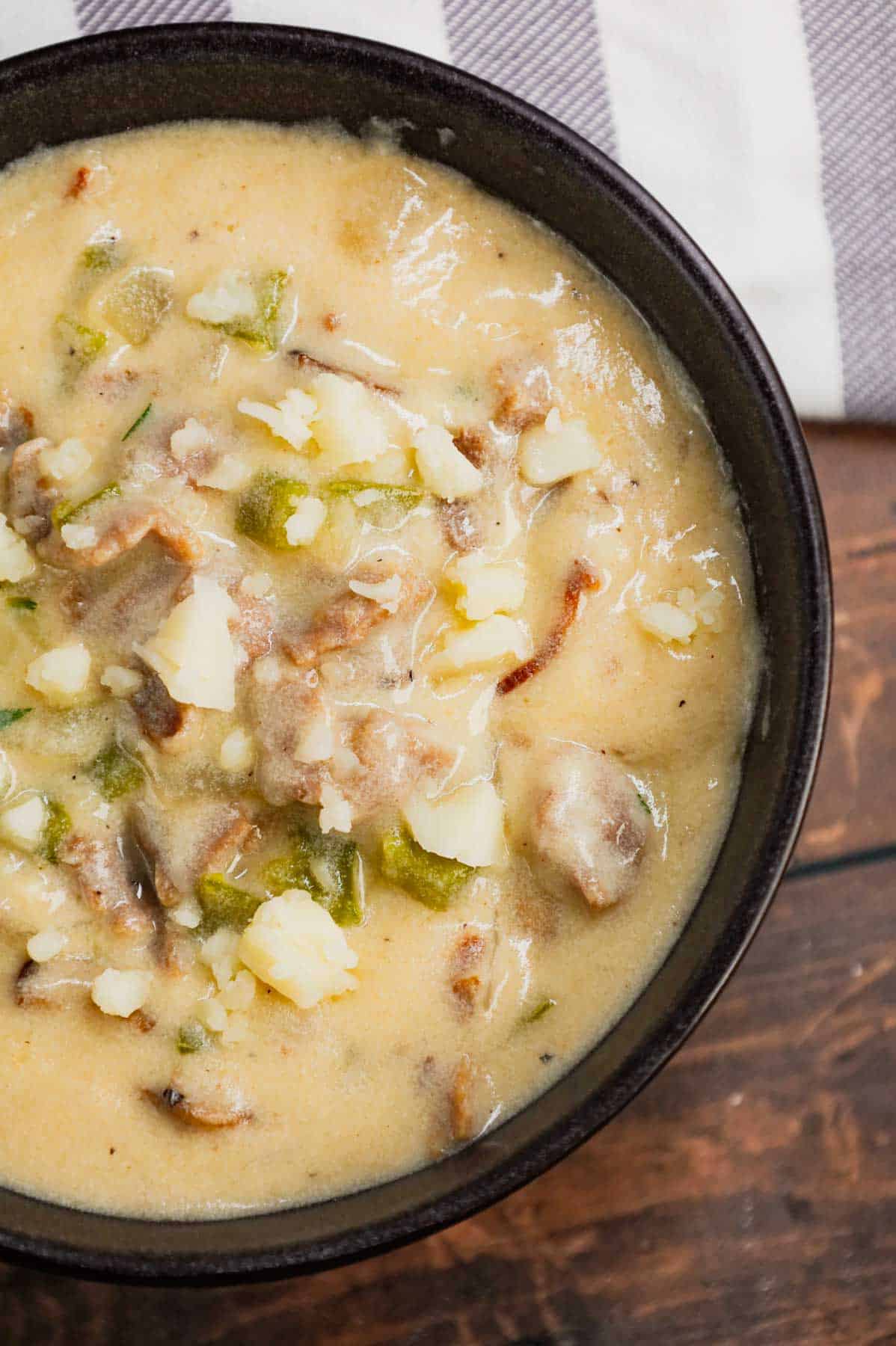 Philly Cheese Steak Soup is a hearty soup loaded with chopped deli roast beef, diced onions, green bell peppers, sliced mushrooms and provolone cheese.