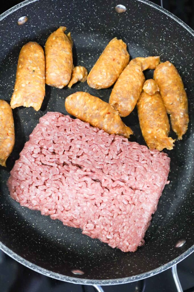ground beef and Italian sausage meat in a skillet
