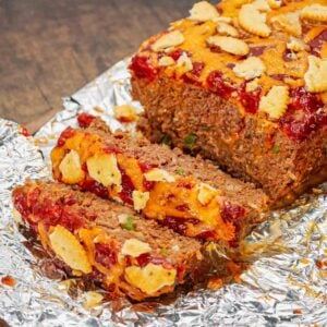 Ritz Cracker Meatloaf is a delicious ground beef meatloaf loaded with crushed Ritz crackers, onion soup mix, onions, green bell peppers and cheddar cheese.