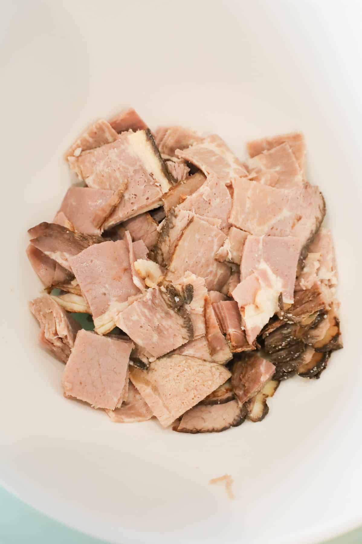 chopped roast beef in a mixing bowl