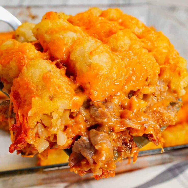 Roast Beef and Cheddar Tater Tot Casserole is a hearty dish loaded with deli roast beef, shredded cheddar cheese, cheddar soup, French's crispy fried onions and tater tots.