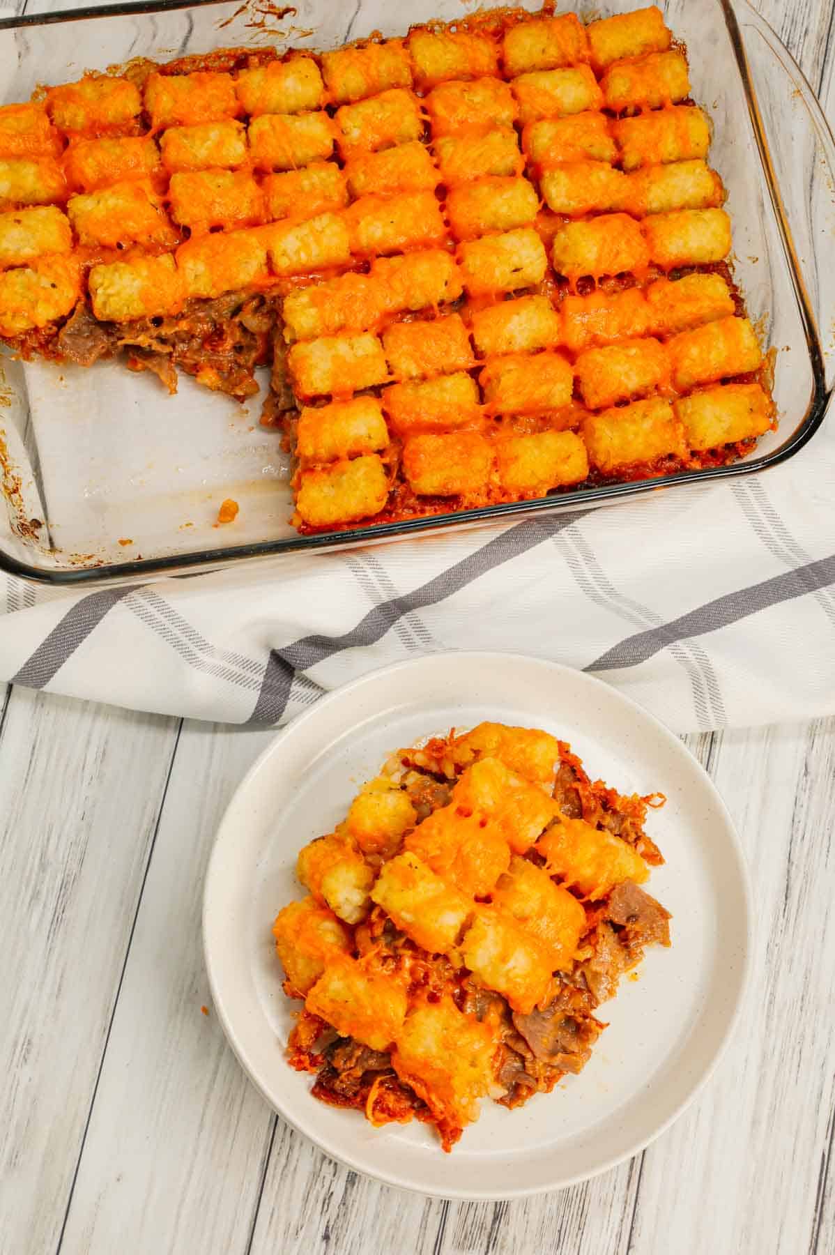 Roast Beef and Cheddar Tater Tot Casserole is a hearty dish loaded with deli roast beef, shredded cheddar cheese, cheddar soup, French's crispy fried onions and tater tots.