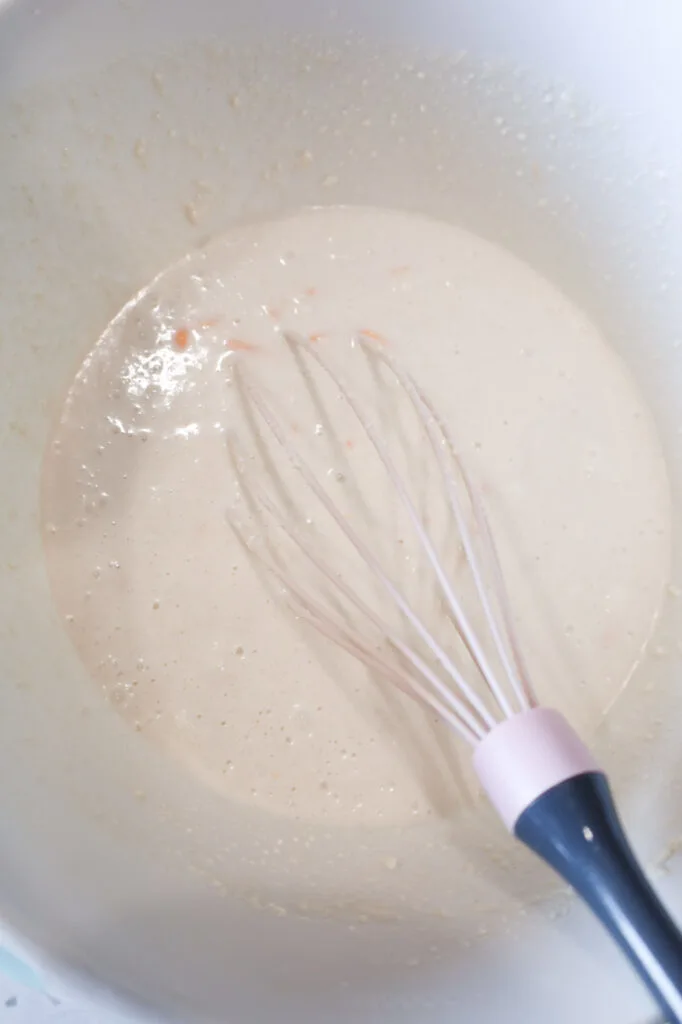 cheddar bay biscuit batter in a mixing bowl