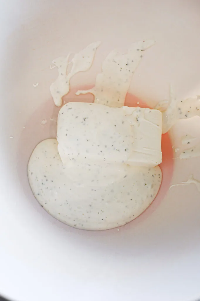 ranch dressing and cream cheese in a mixing bowl