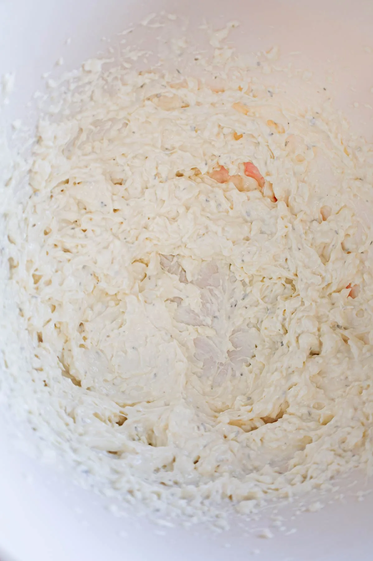 ranch dressing and cream cheese mixture in a mixing bowl