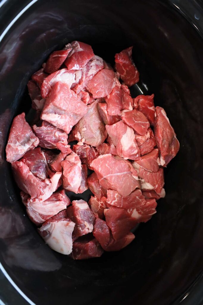 chunks of stew beef in a Crock Pot