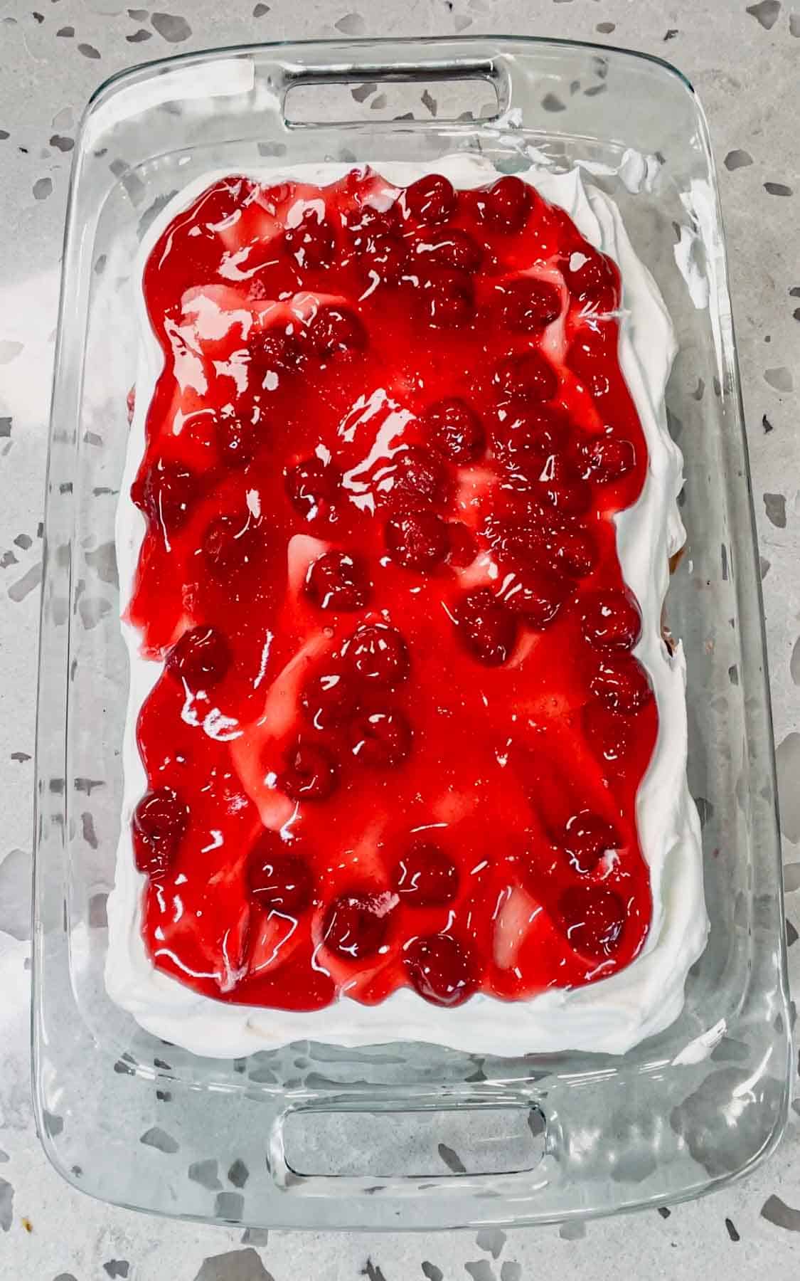 cherry pie filling on top of black forest ice cream sandwich cake
