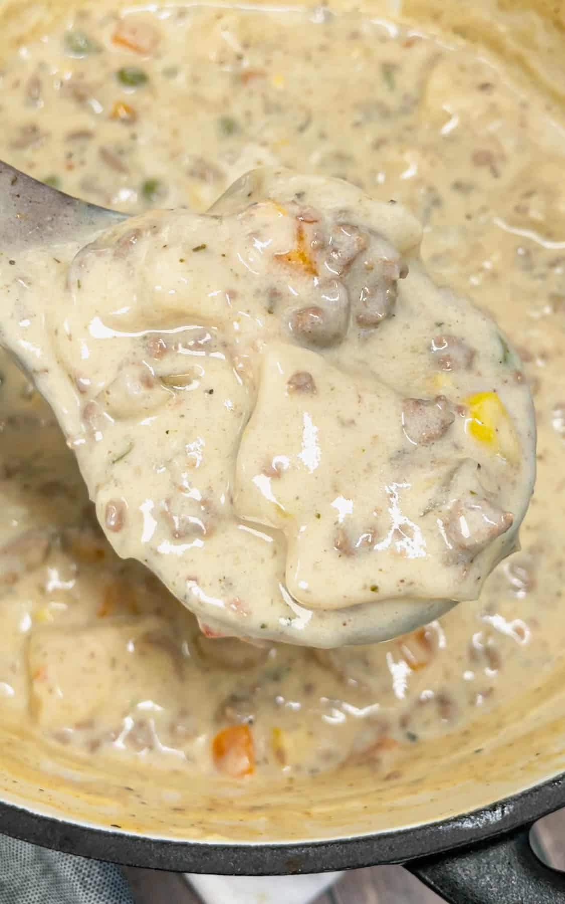 Ground Beef and Dumplings is a delicious comfort dish loaded with ground beef, mixed veggies and Pillsbury biscuit dumplings all cooked in a creamy and flavourful soup mixture.