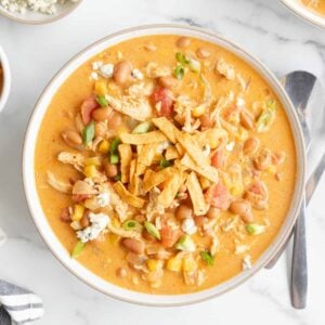 Craving the hearty warmth of chili with a spicy twist? This Buffalo Chicken Chili combines zesty buffalo flavor with tender chicken and creamy beans, creating a cozy bowl that’s sure to heat up your taste buds and become a new game-day favorite! This recipe is loaded with pinto beans, cream cheese, celery, chicken breast, corn, Buffalo sauce and diced tomatoes.